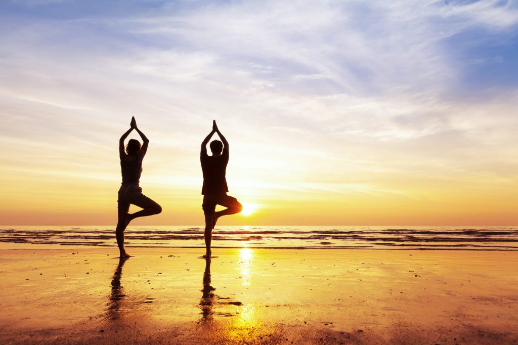 Yoga sulla spiaggia
